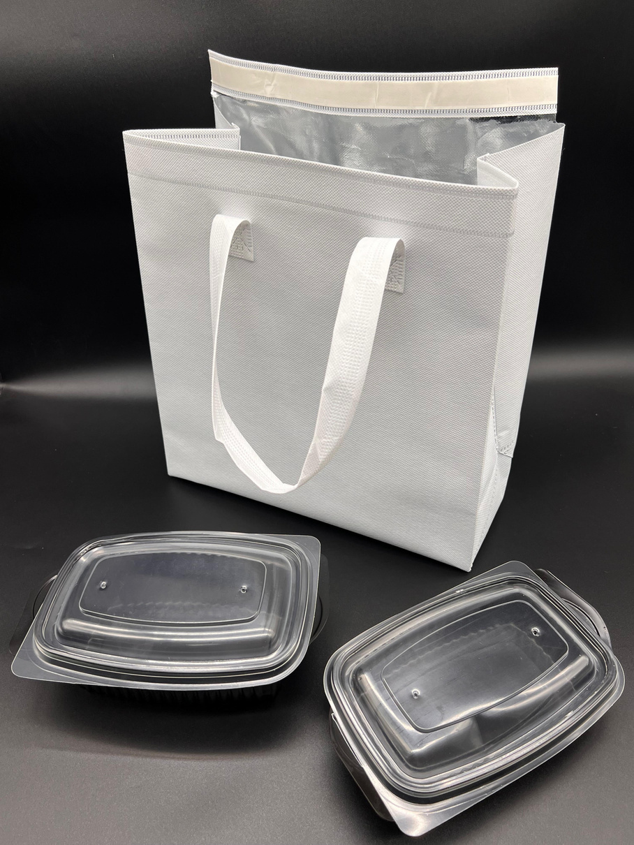 Sac isotherme bébévert blanc — vue de profil avec poignées renforcées